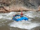 A raft in the whitewater of Crystal Rapid, Grand Canyon